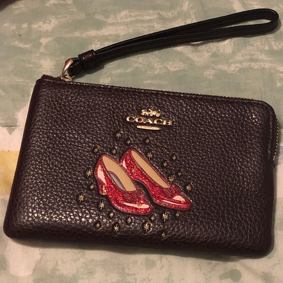coach wizard of oz wristlet